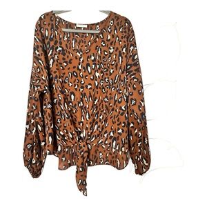 Adrienne Very cute Leapord print top! V- neck, tie front, pretty colors! Sz: L